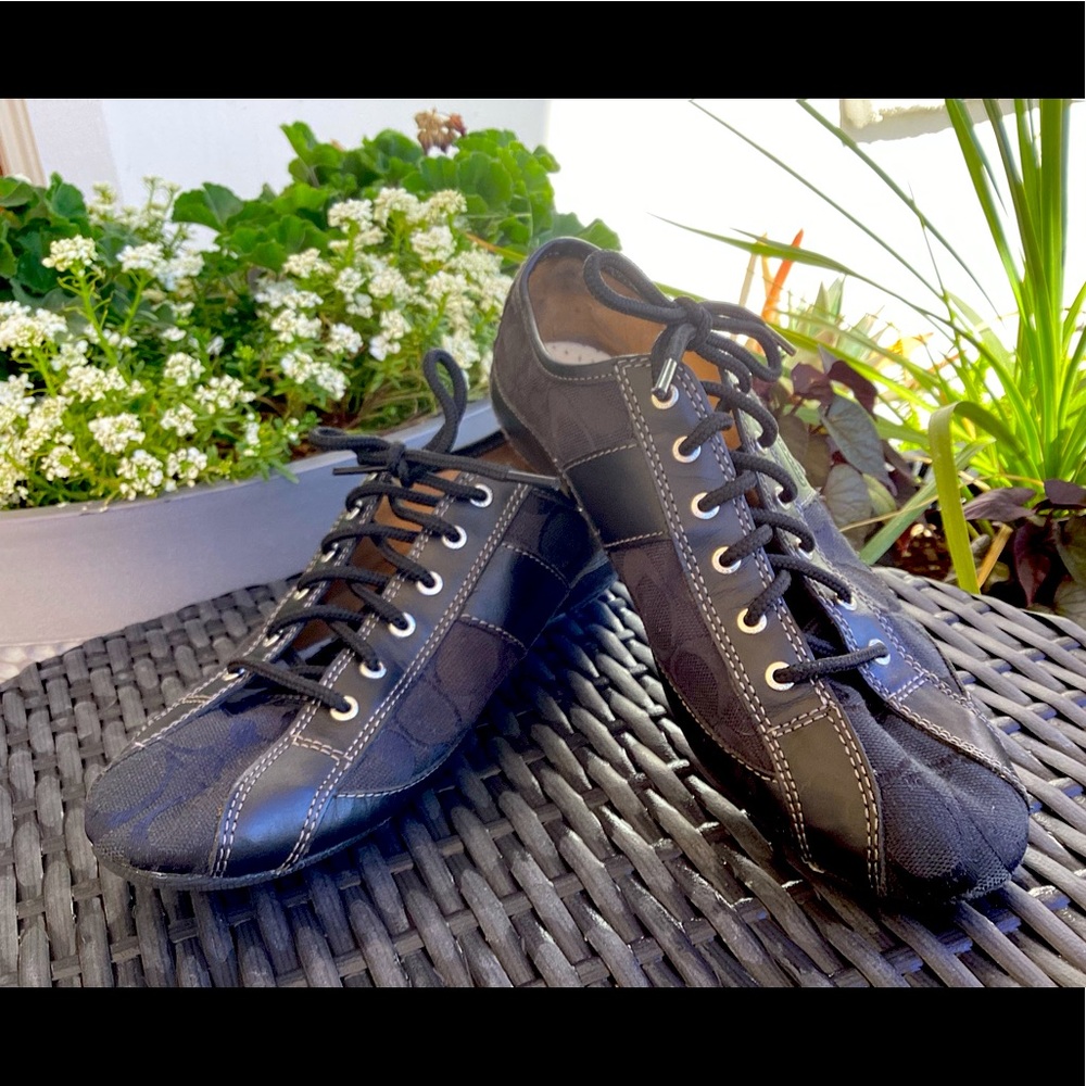 Pre-owned, lightly worn.Black Coach leather shoes